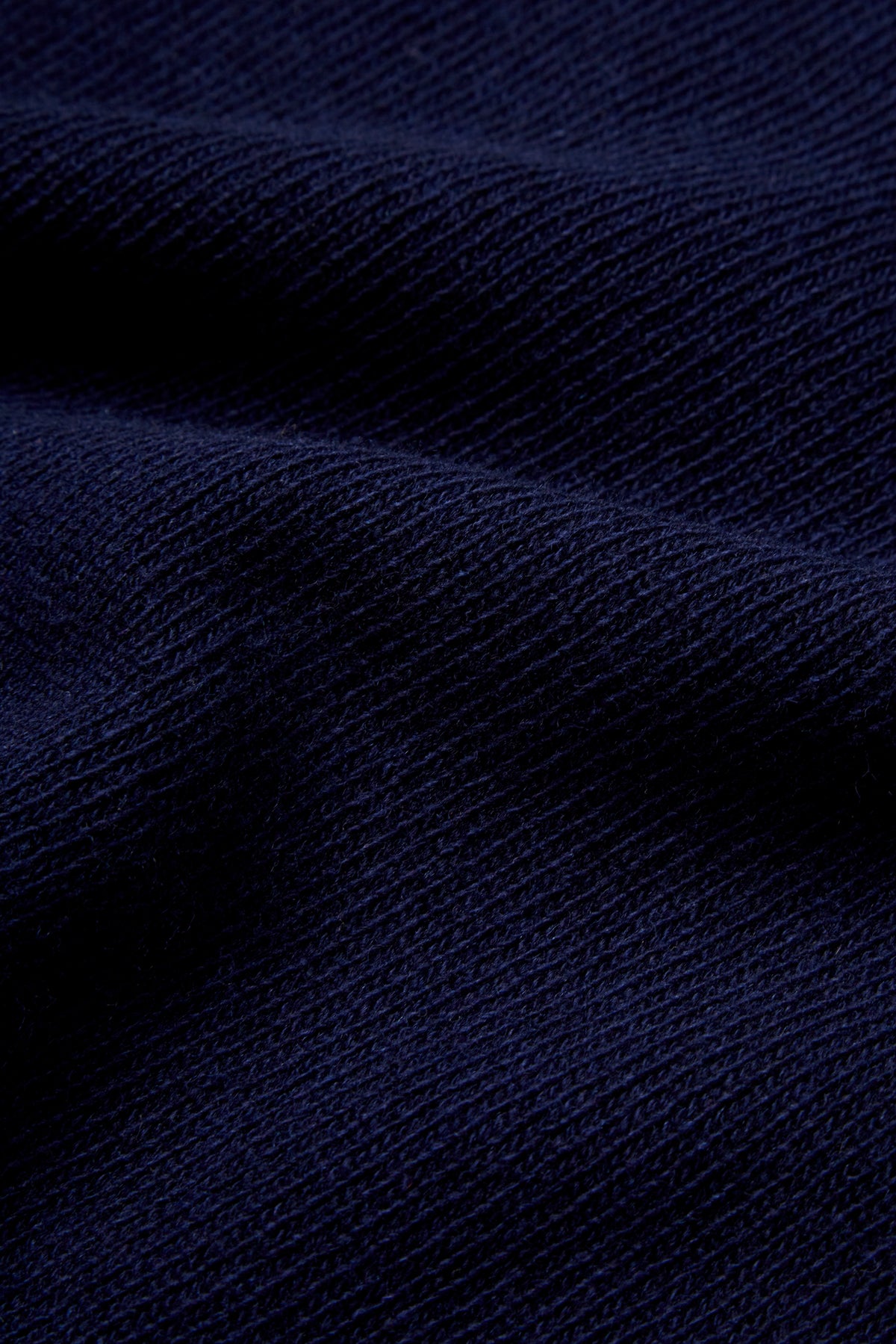 POLO EN LAINE TRICOTÉE MARINE AVEC LOGO