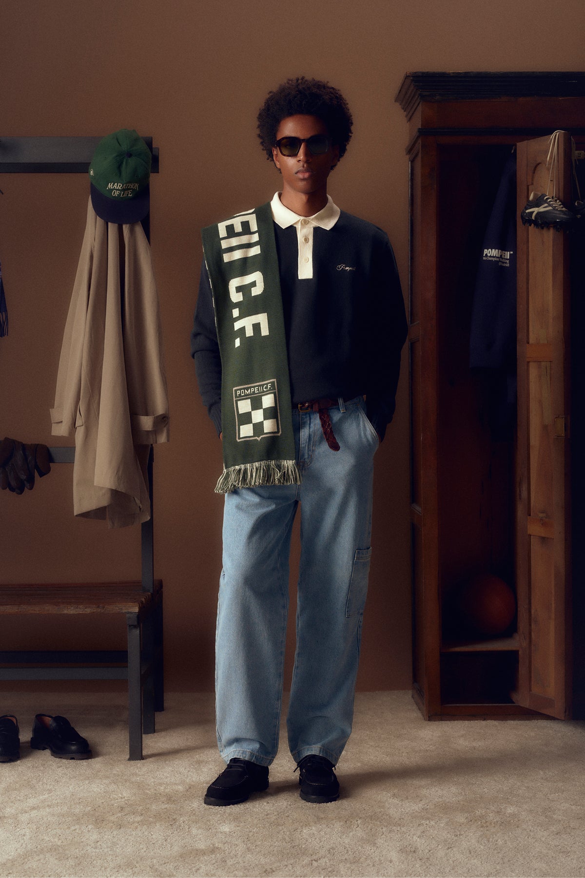 POLO EN LAINE TRICOTÉE MARINE AVEC LOGO